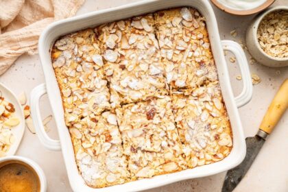 Freshly baked almond croissant baked oatmeal cut into squares.