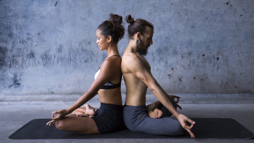 Valentine’s Day: How couples yoga helps to relieve stress in your relationship